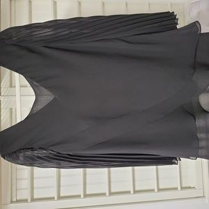 Hot in Hollywood size large blouse. Can be worn either side in front
